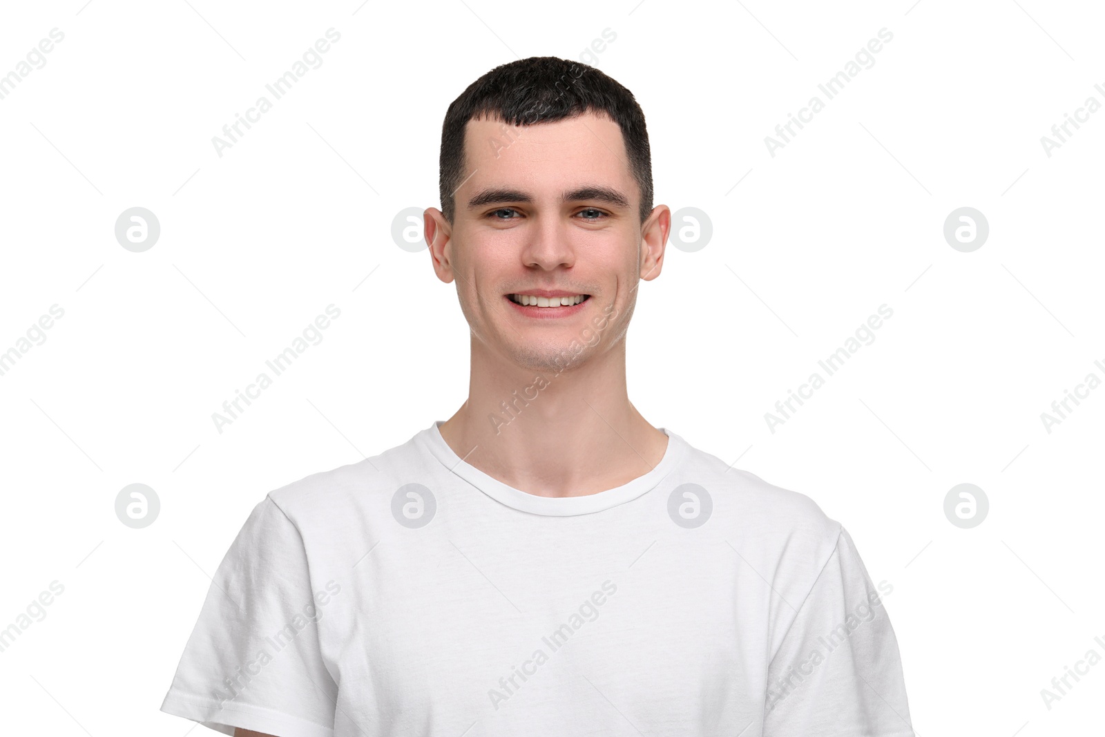 Photo of Handsome young man with clean teeth smiling on white background