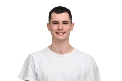 Handsome young man with clean teeth smiling on white background