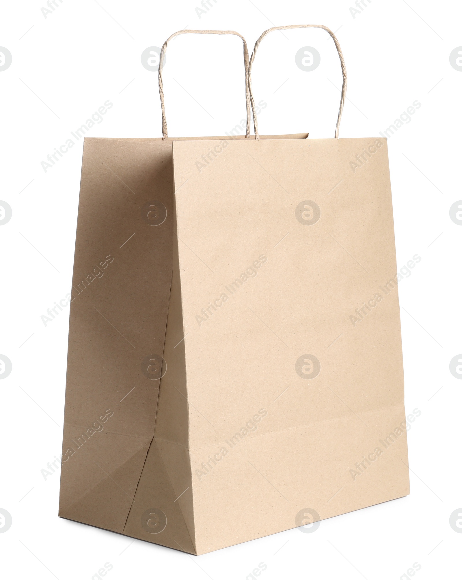 Photo of One kraft paper bag isolated on white. Mockup for design