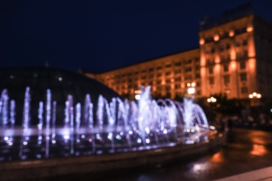 Photo of Blurred view of beautiful city at night. Bokeh effect