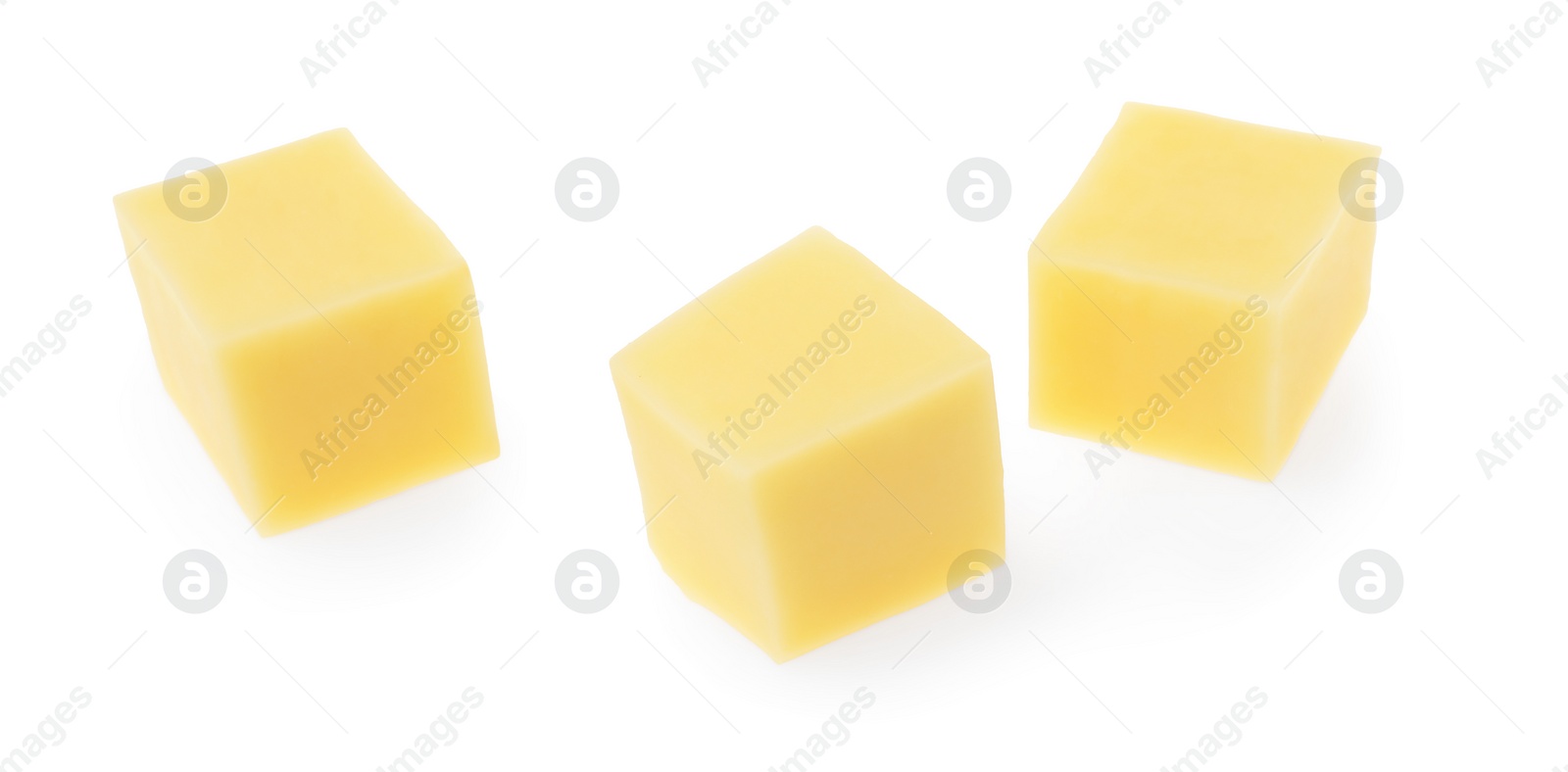 Photo of Cubes of tasty cheese isolated on white