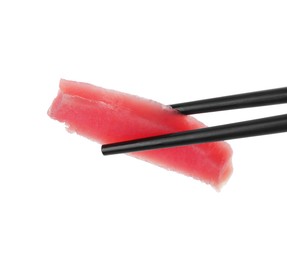 Photo of Chopsticks with tasty sashimi (piece of fresh raw tuna) isolated on white