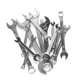 Set of different wrenches on white background, top view. Plumbing tools