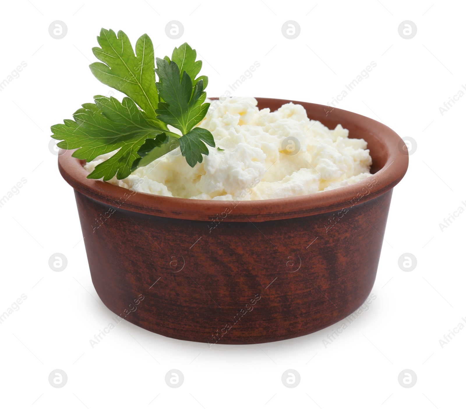 Photo of Delicious tofu cream cheese with parsley in bowl isolated on white