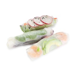 Photo of Delicious spring rolls wrapped in rice paper isolated on white