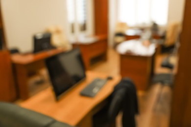 Photo of Blurred view of modern office interior. Bokeh effect