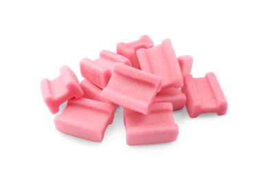 Photo of Pile of tasty pink chewing gums on white background