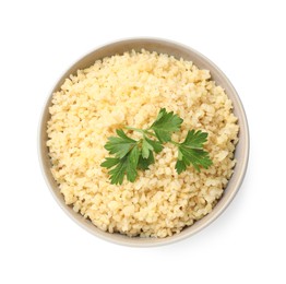 Photo of Delicious bulgur with parsley in bowl isolated on white, top view