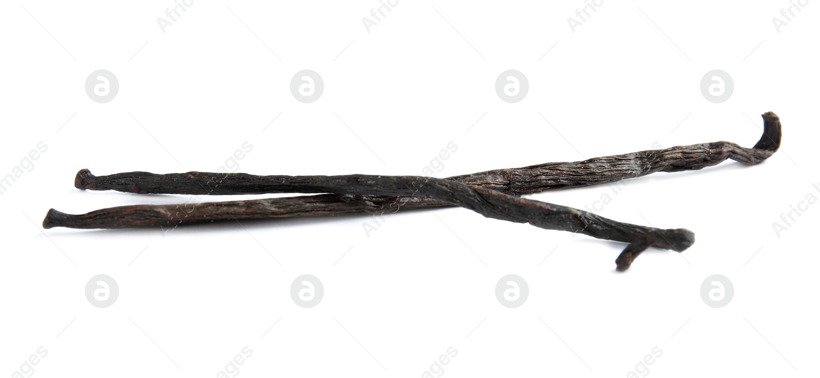 Photo of Dried aromatic vanilla sticks on white background