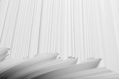 Photo of White paper sheets as background, closeup view