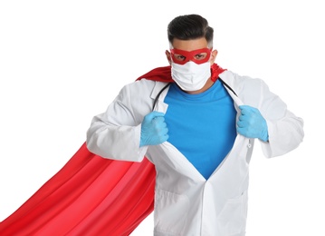 Photo of Doctor wearing face mask and cape on white background. Super hero power for medicine