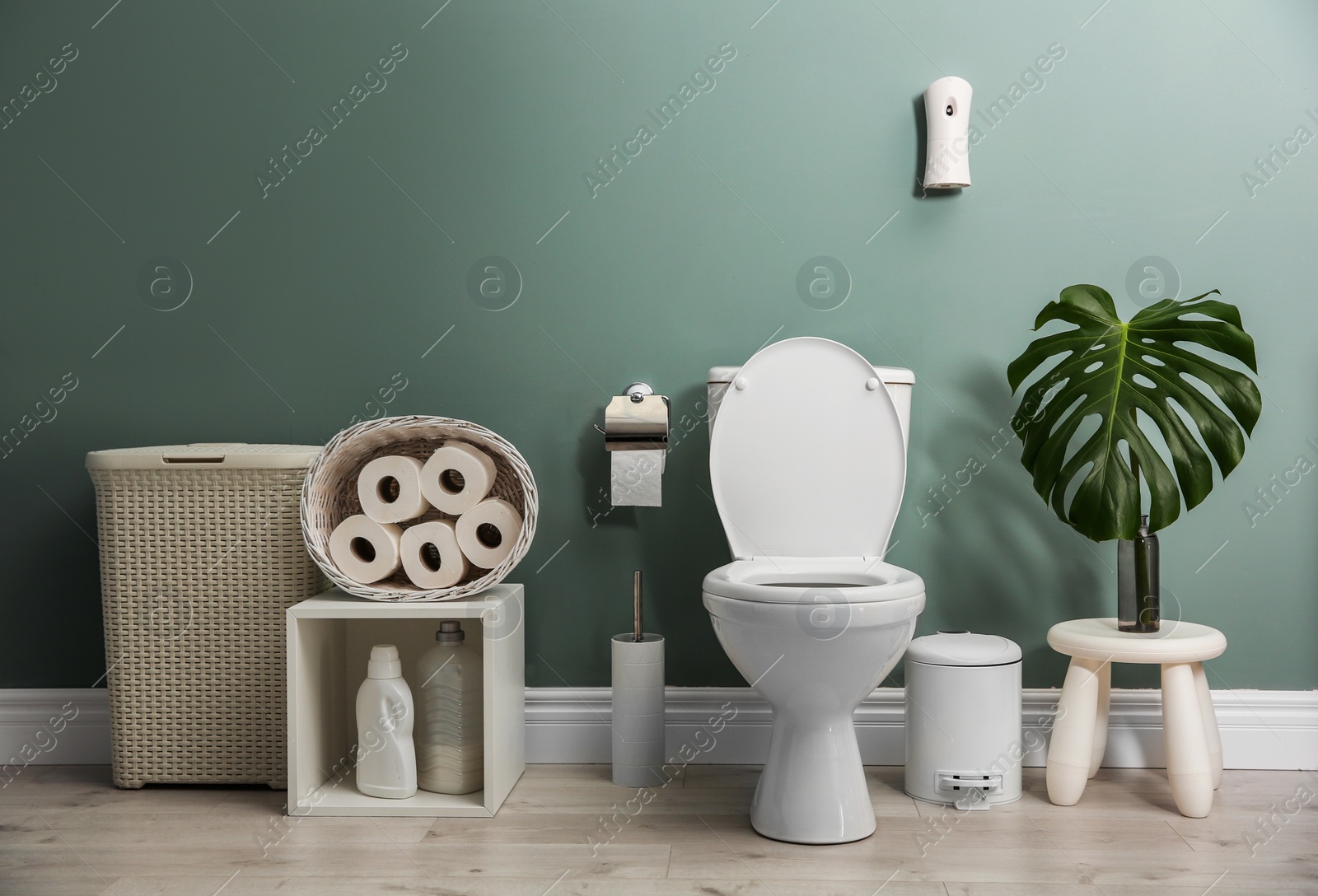 Photo of Bathroom interior with new ceramic toilet bowl