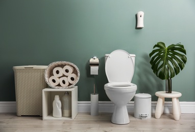 Photo of Bathroom interior with new ceramic toilet bowl