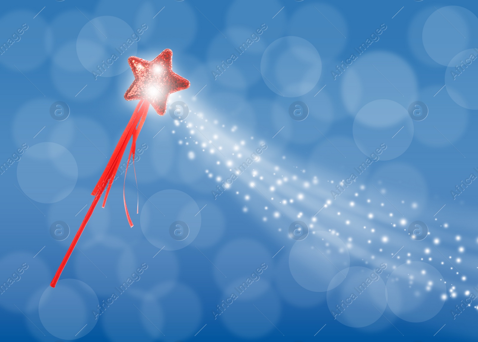 Image of Beautiful magic wand with fairy sparkle on light blue background