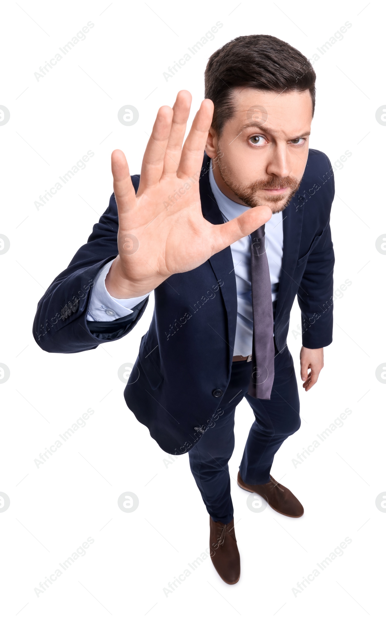 Photo of Handsome bearded businessman in suit on white background, above view