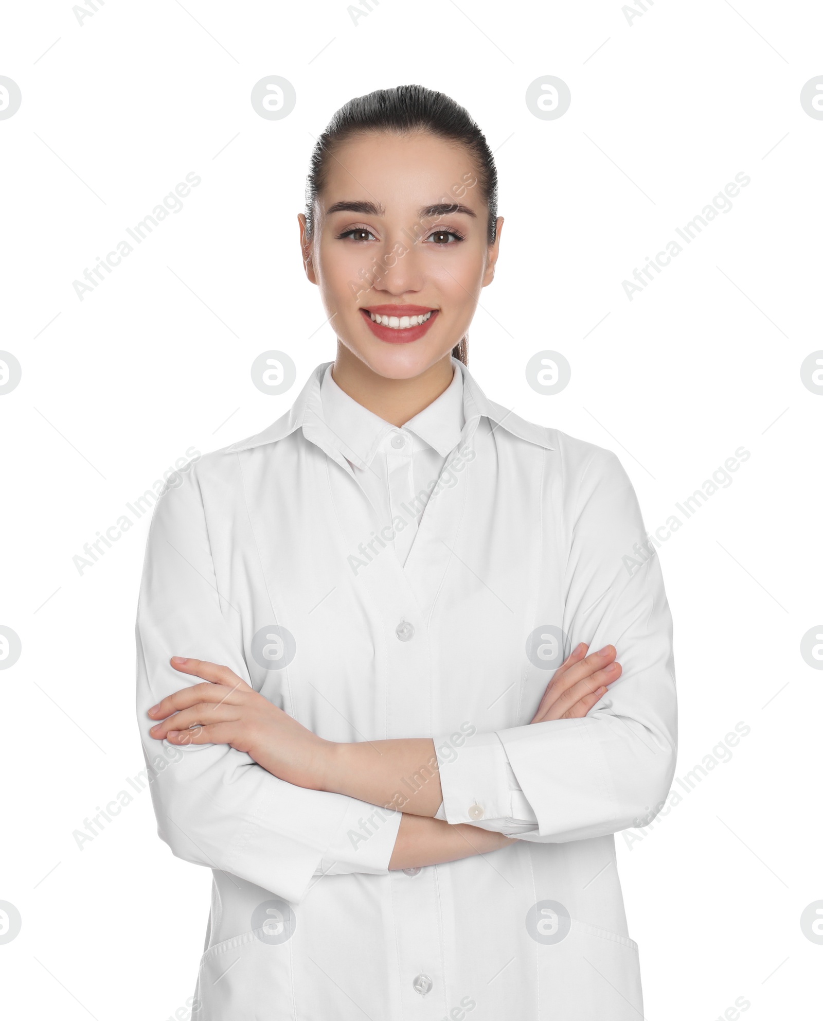 Photo of Happy young woman in lab coat on white background