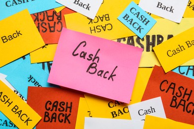 Photo of Many different paper cards with word Cashback, top view