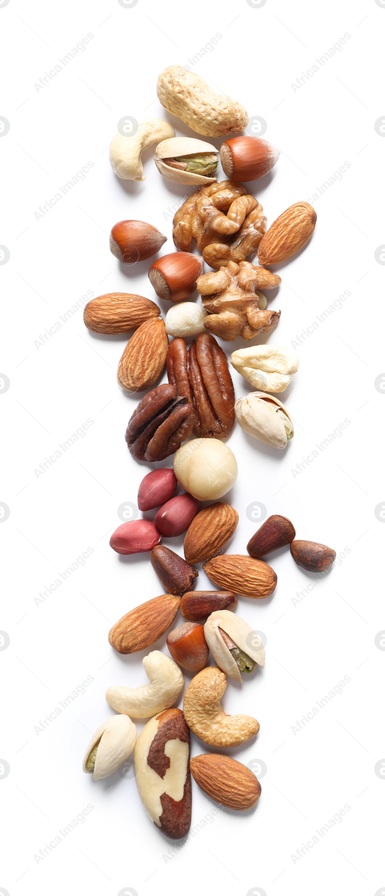 Photo of Mixed organic nuts on white background, top view