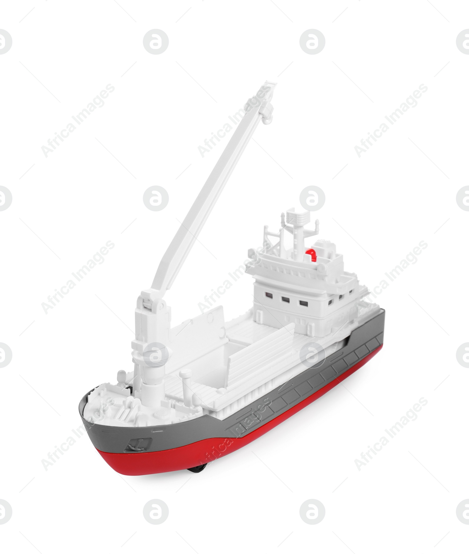 Photo of Toy cargo vessel isolated on white. Export concept