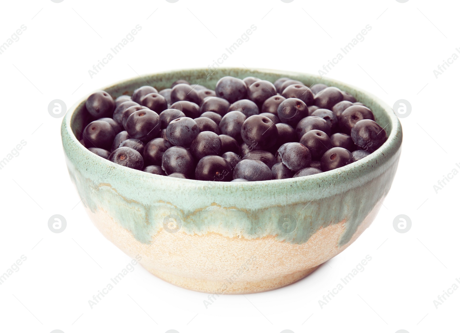 Photo of Bowl with fresh acai berries on white background