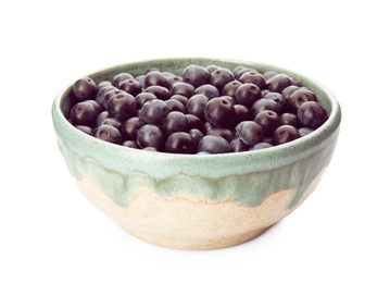 Photo of Bowl with fresh acai berries on white background