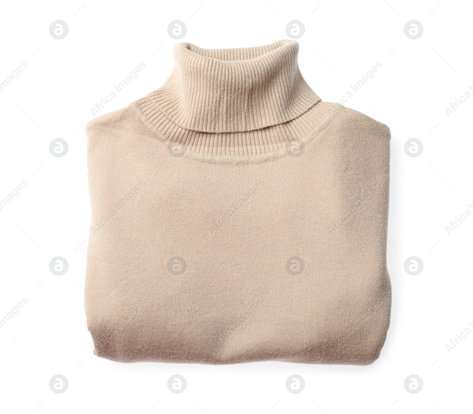 Photo of Folded warm sweater isolated on white, top view