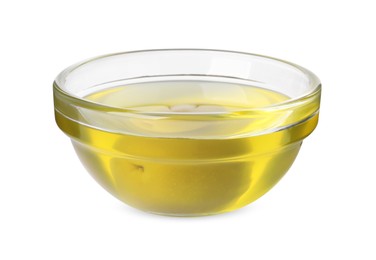 Photo of Olive oil in glass bowl on white background. Healthy cooking