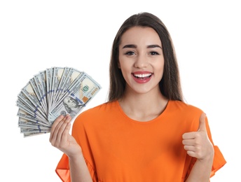 Portrait of happy young woman with money on white background