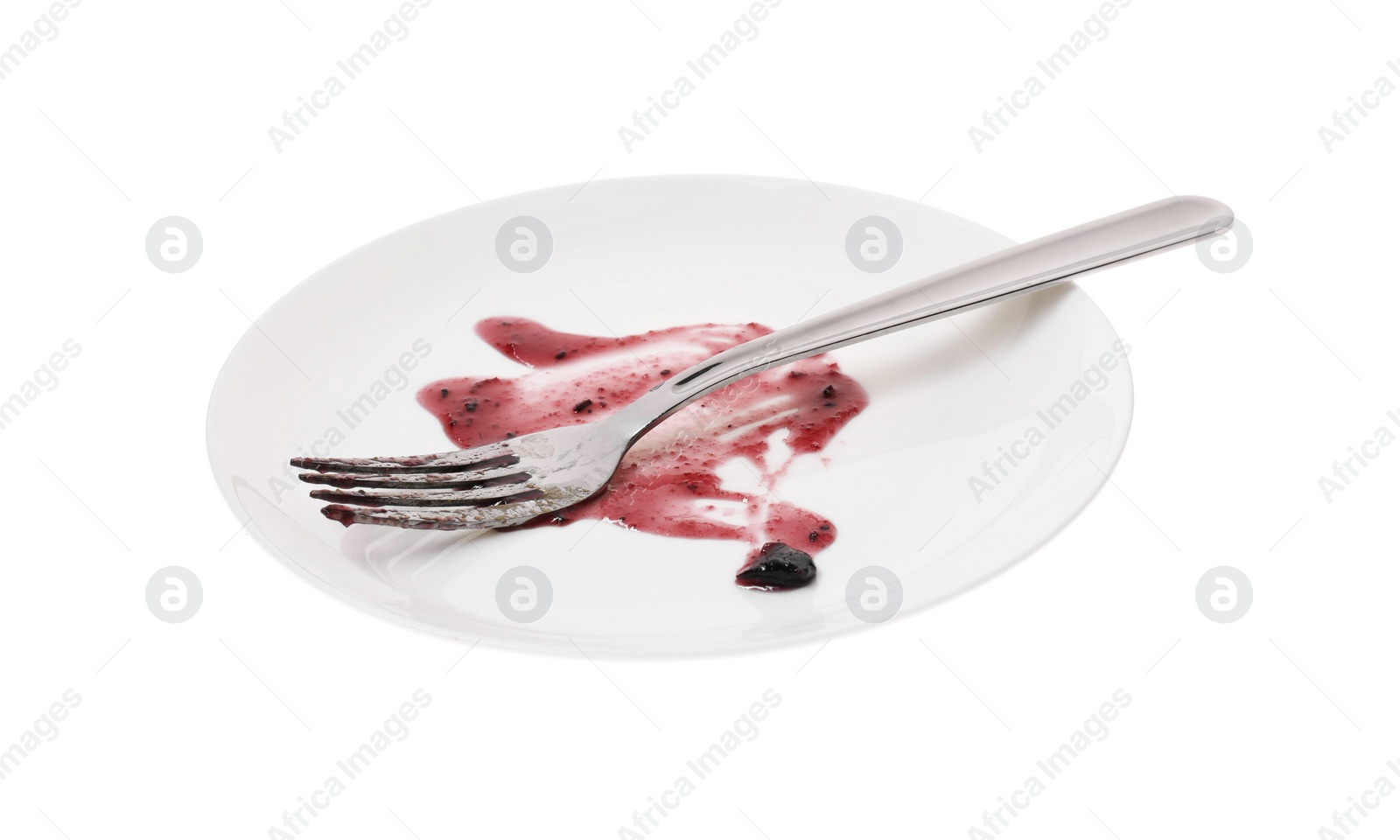 Photo of Dirty plate and fork on white background