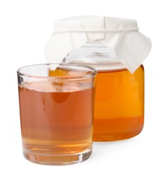 Tasty kombucha in jar and glass isolated on white