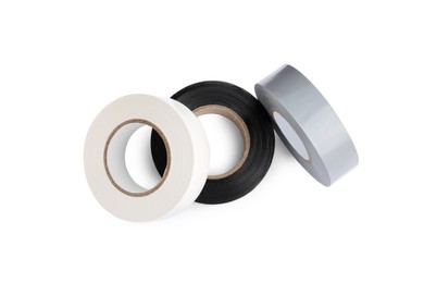 Photo of Colorful insulating tapes on white background, top view