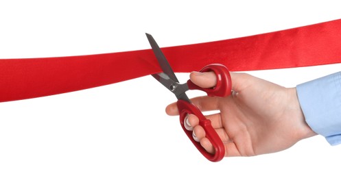 Photo of Man cutting red ribbon on white background, closeup