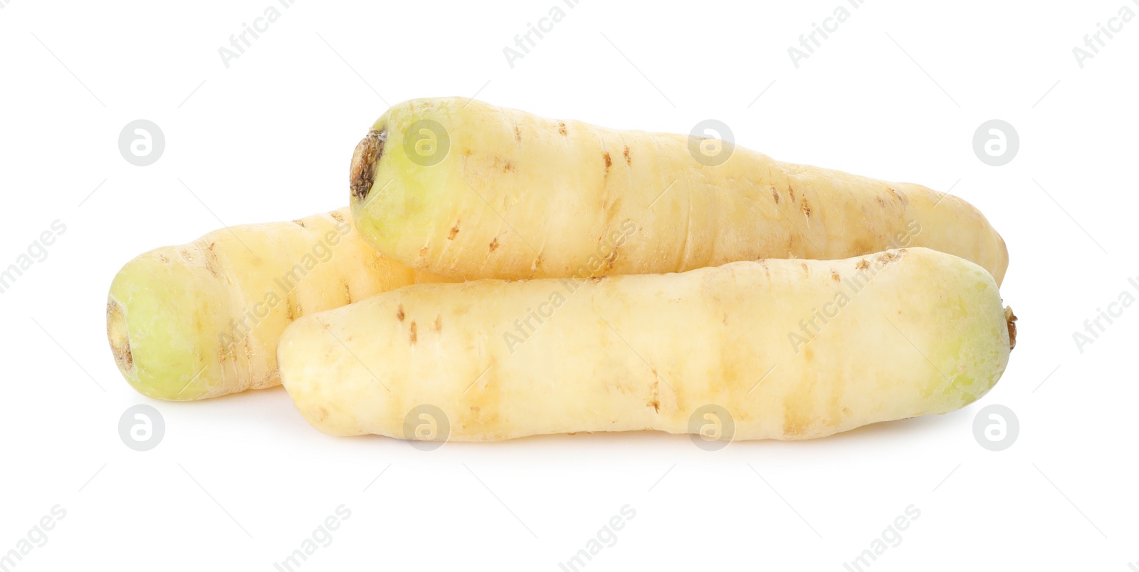 Photo of Whole fresh raw carrots isolated on white