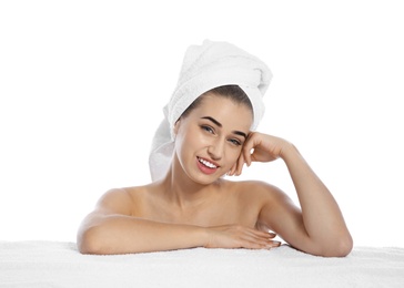 Photo of Portrait of young pretty woman with towel on white background