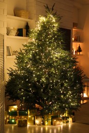 Photo of Stylish living room interior with beautiful Christmas tree