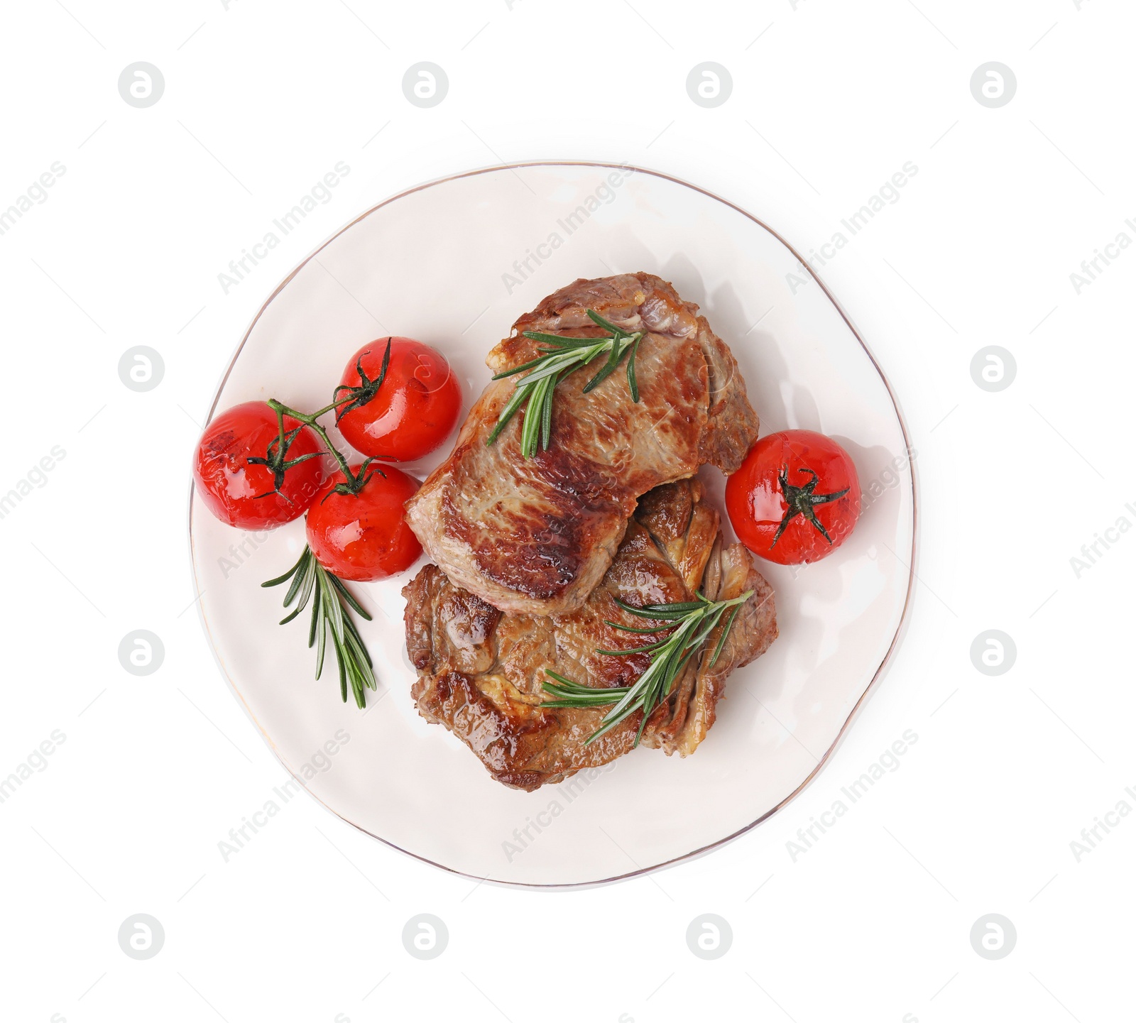 Photo of Plate of delicious fried meat with rosemary and tomatoes isolated on white, top view