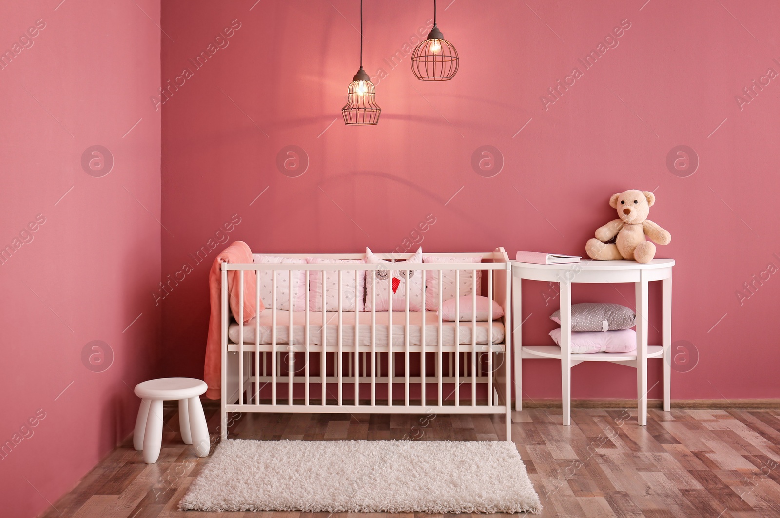 Photo of Modern baby room interior with crib