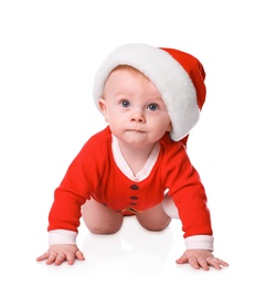 Photo of Cute little baby in Santa Claus suit on white background. Christmas celebration