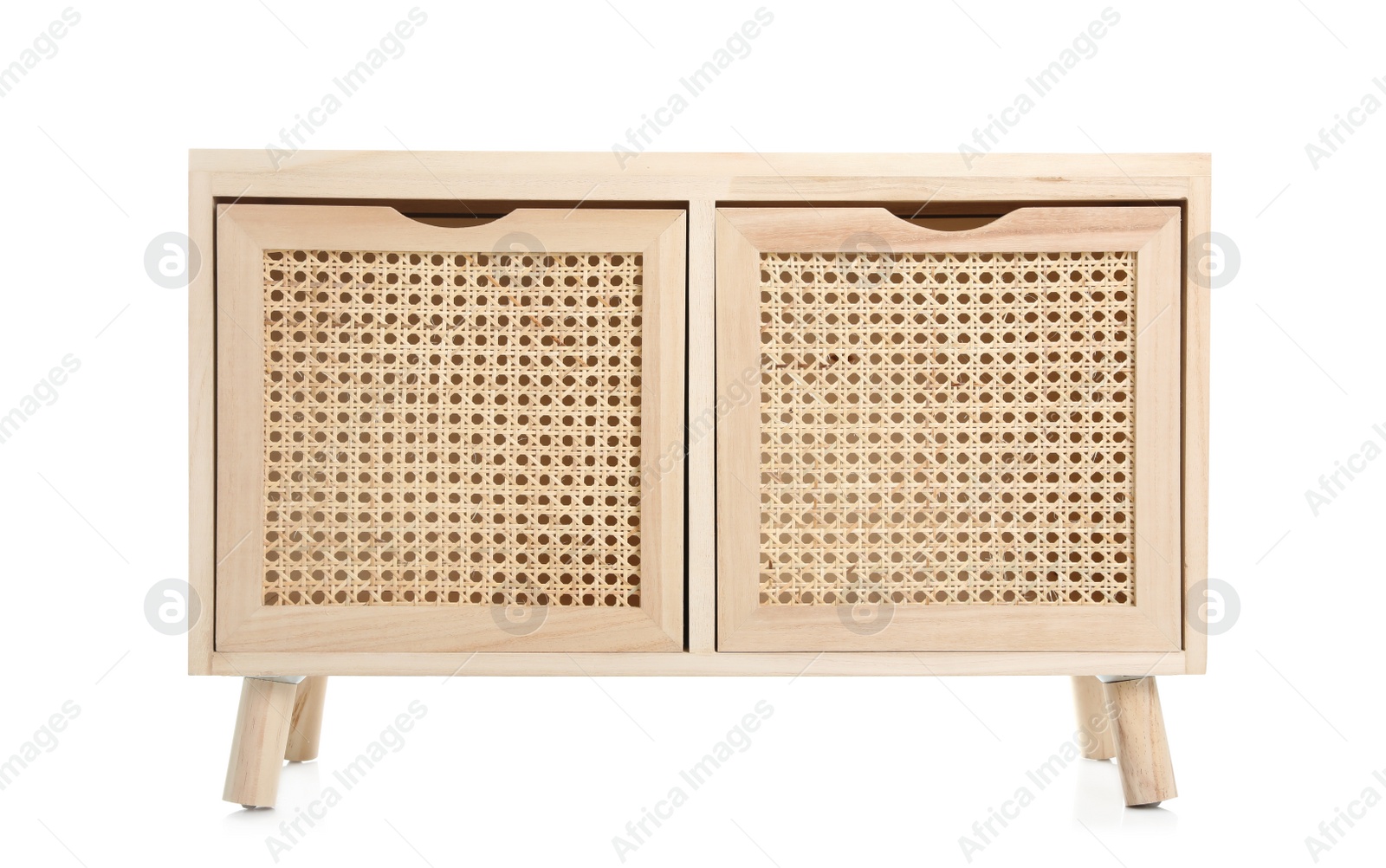 Photo of New wooden commode on white background. Interior element