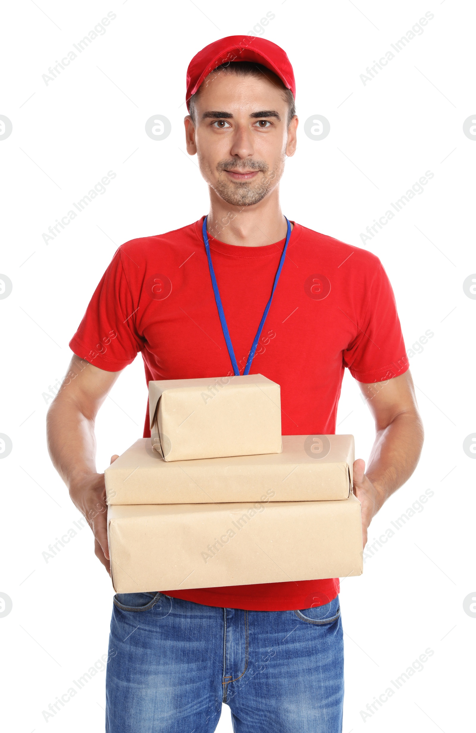 Photo of Happy young courier with parcels on white background
