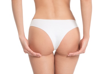 Photo of Slim young woman with smooth gentle skin on white background, closeup. Beauty and body care concept