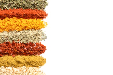 Photo of Rows of different aromatic spices on white background, top view with space for text
