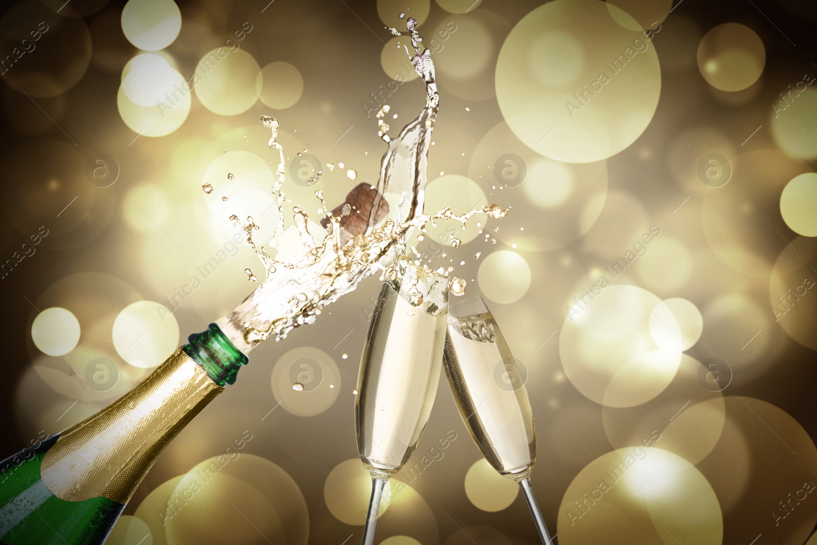 Image of Sparkling wine splashing out of bottle and glasses on color background, bokeh effect