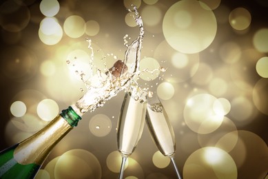 Image of Sparkling wine splashing out of bottle and glasses on color background, bokeh effect