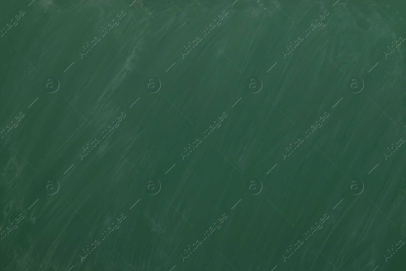 Dirty green chalkboard as background. School equipment Photo of Dirty green chalkboard as background. School equipment