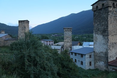 BATUMI, GEORGIA - AUGUST 13, 2022: Picturesque view of small town near mountain forest