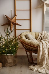 Photo of Stylish room interior with elegant Christmas decor