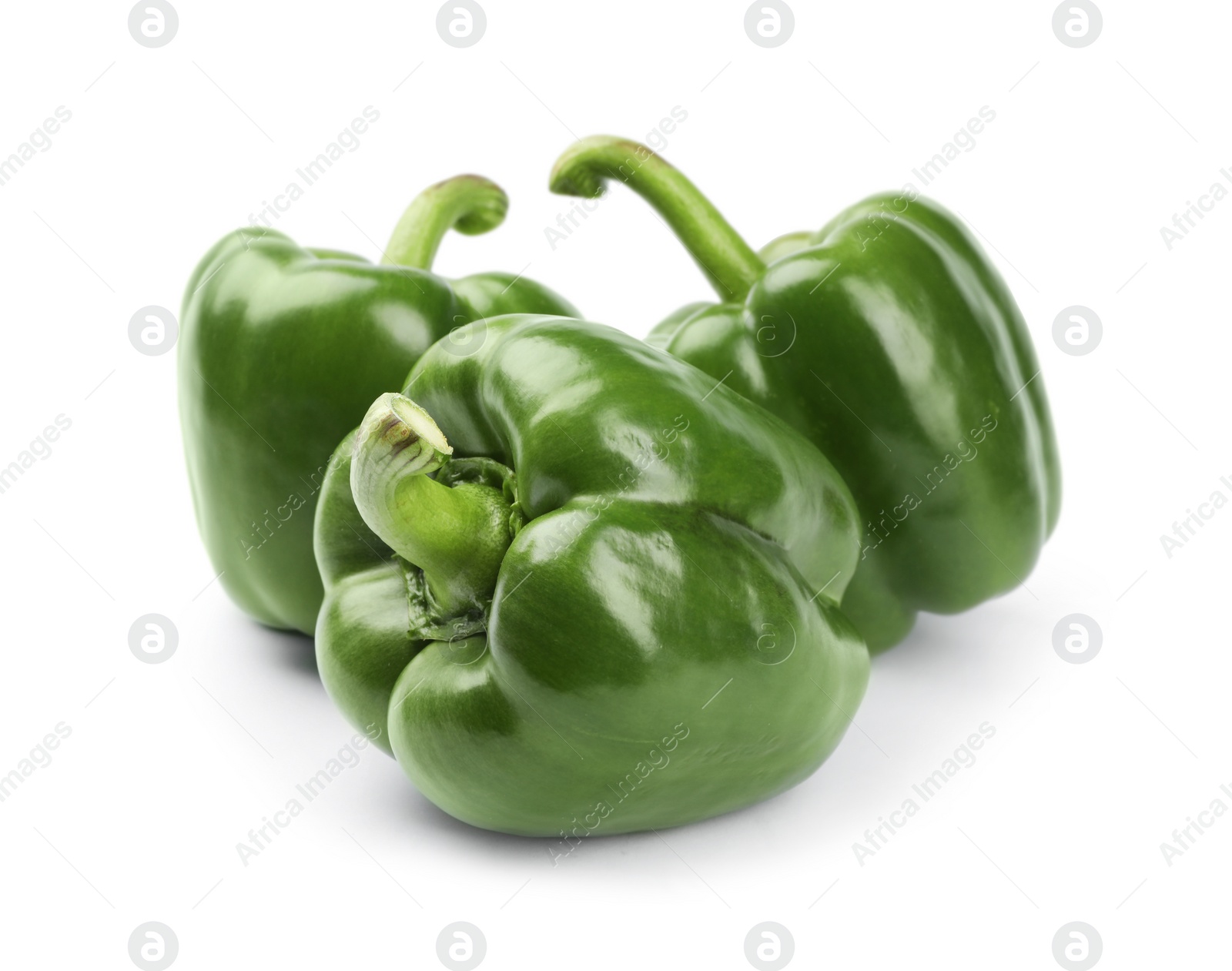 Photo of Ripe green bell peppers on white background