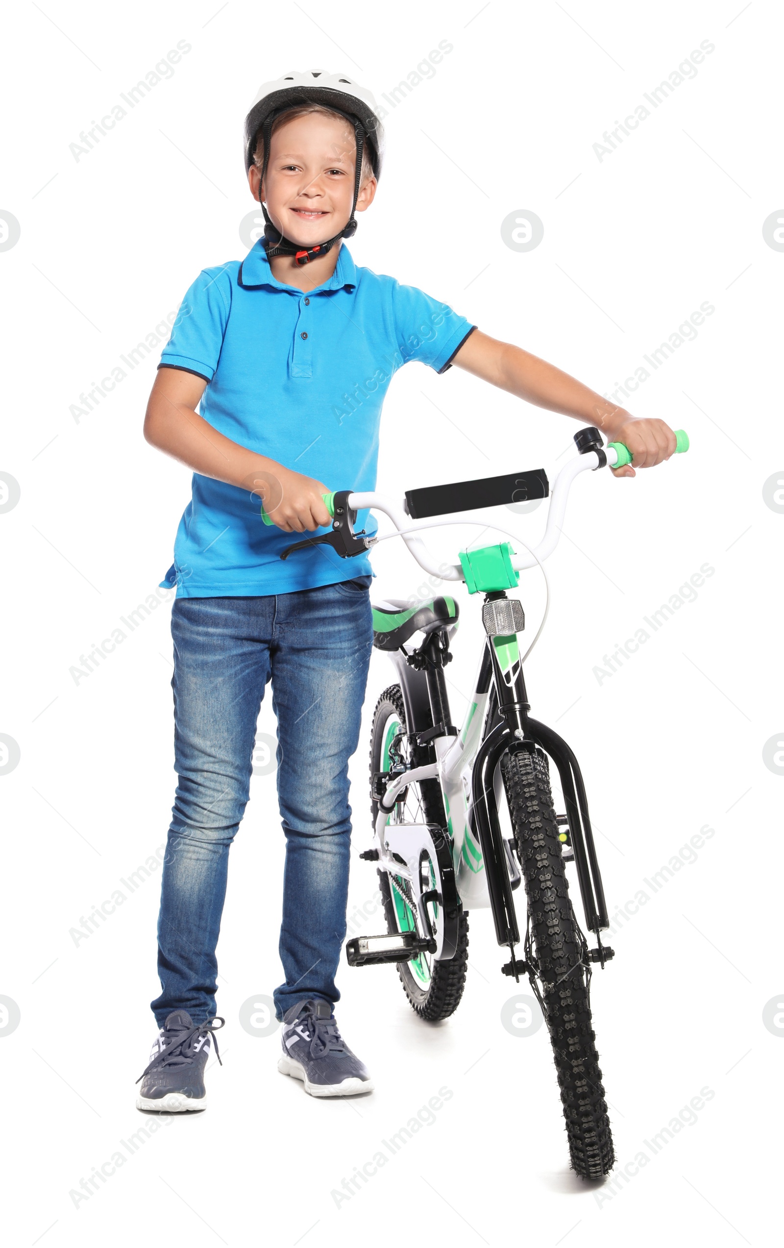 Photo of Portrait of cute little boy with bicycle on white background