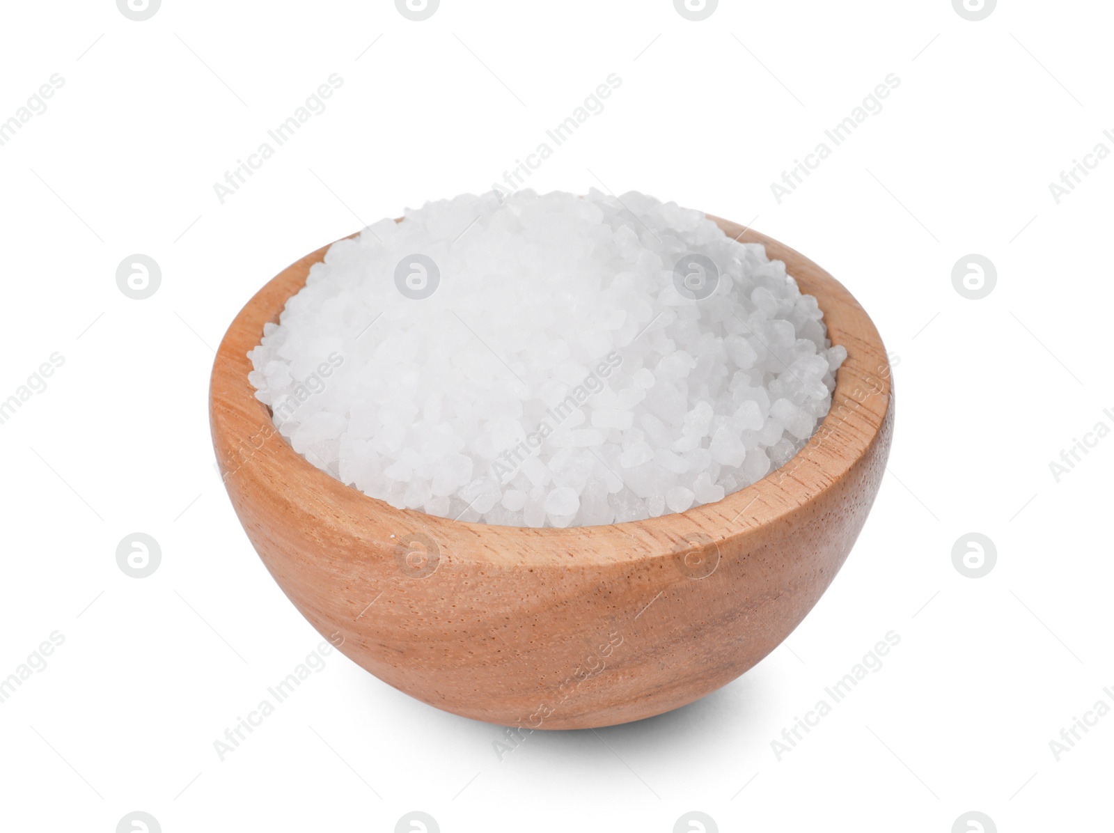 Photo of Wooden bowl with natural sea salt isolated on white